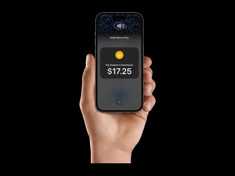 iPhone taking a contactless card payment